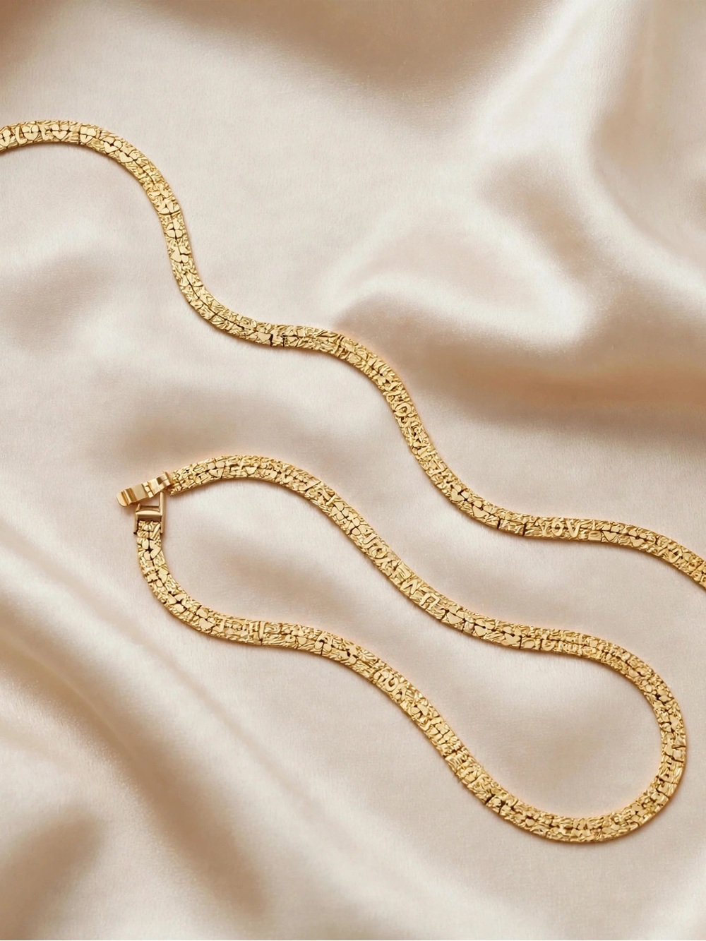 A set of Textured Gold Chain Necklaces